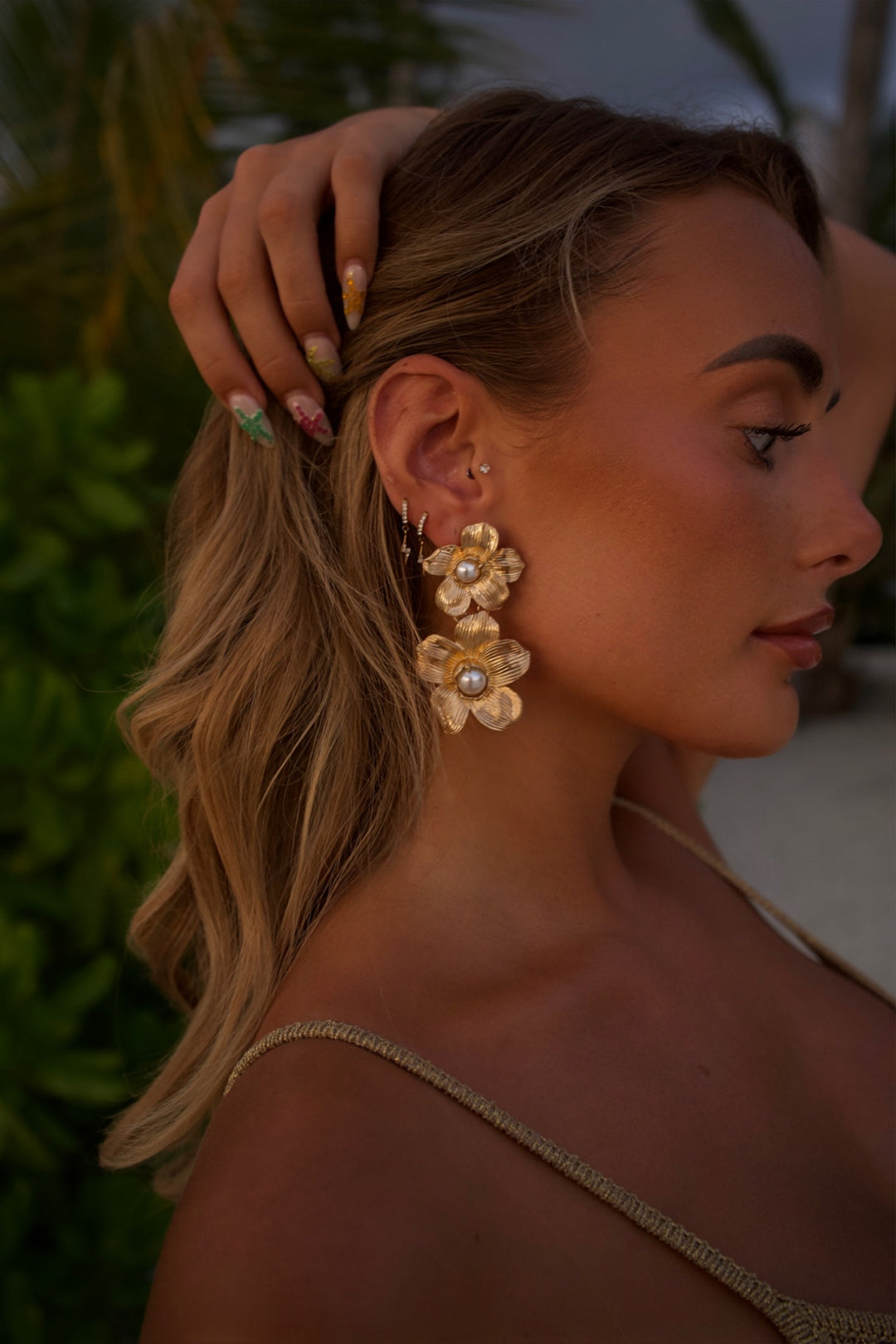 Gold flower drop down earrings