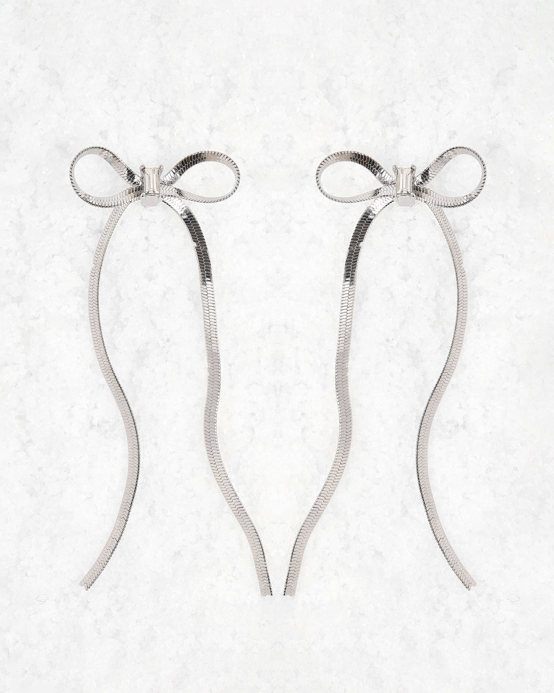 Silver long bow earrings