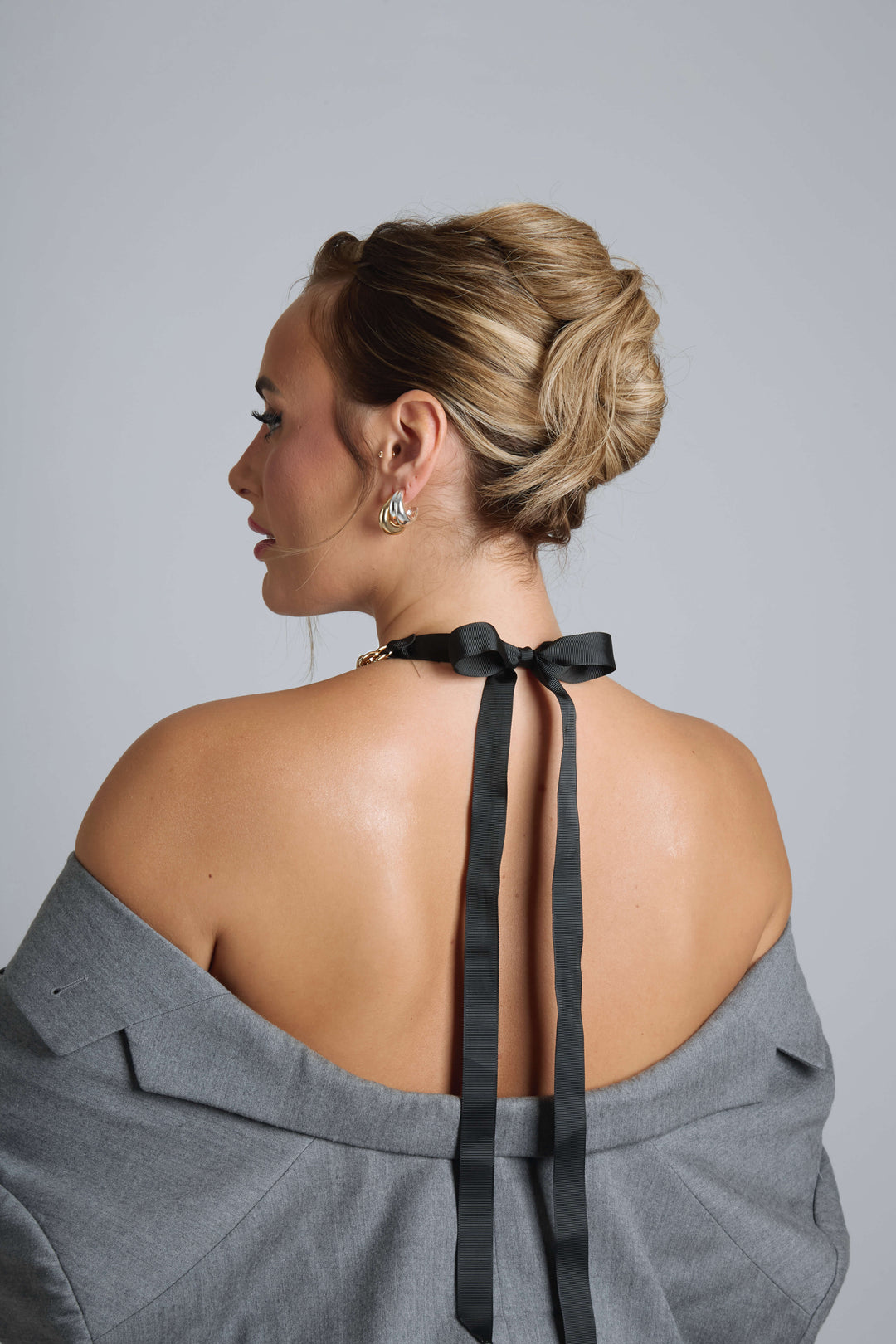 Gold chunky chain necklace with black ribbon