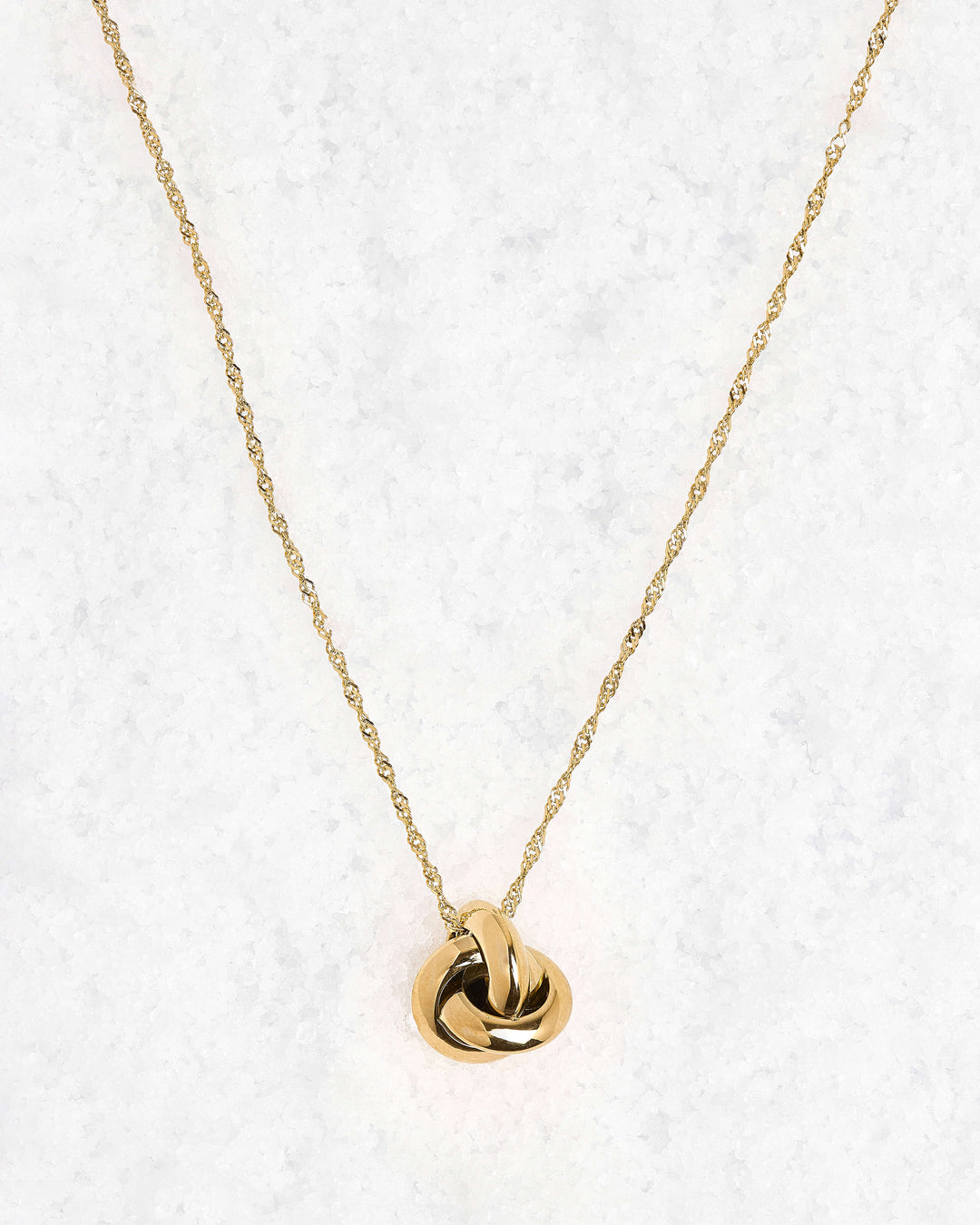 Gold knotted stainless pendant necklace
